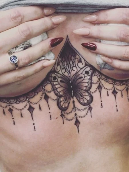 Butterfly and Lace Underboob Tattoo Design