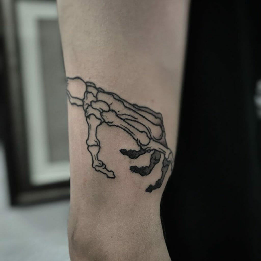 skeleton hand tattoo