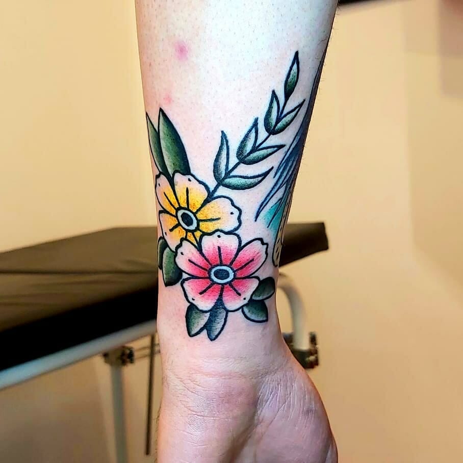 Traditional Floral Wrist Tattoo