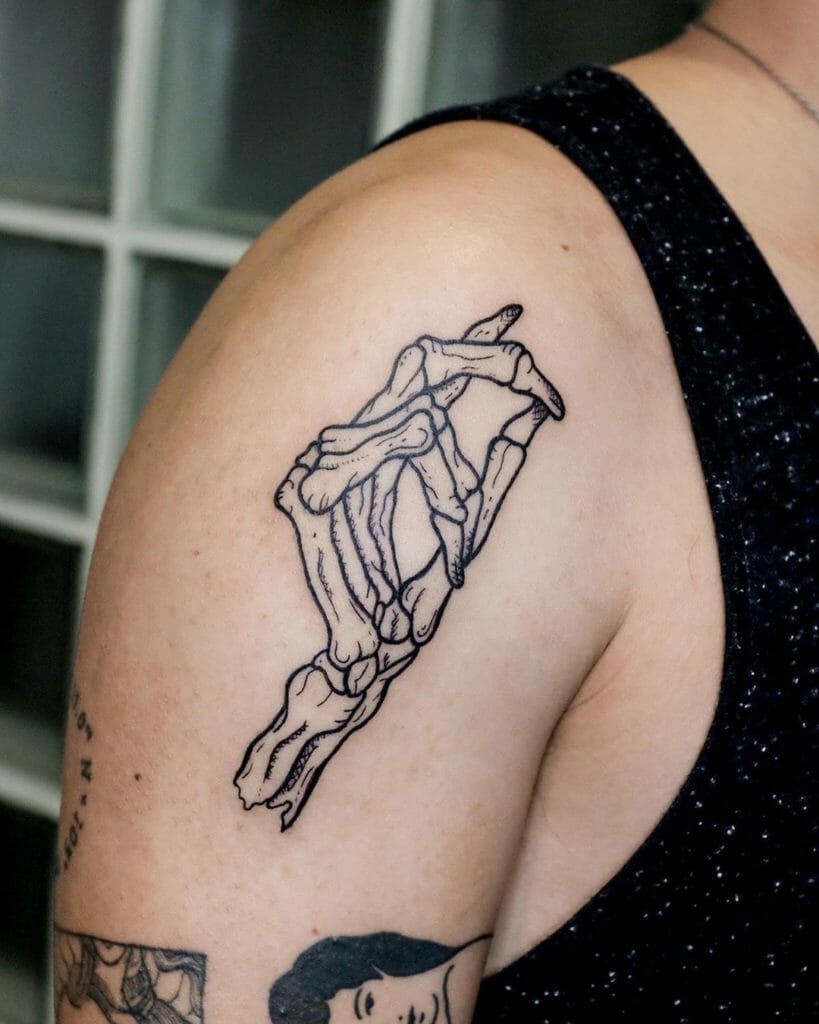 skeleton hand tattoo