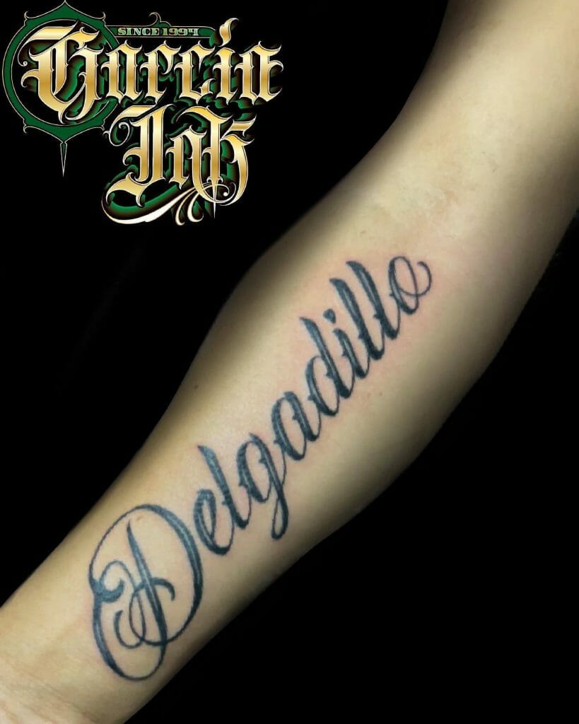  Black Ink Lettering Last Name Tattoo