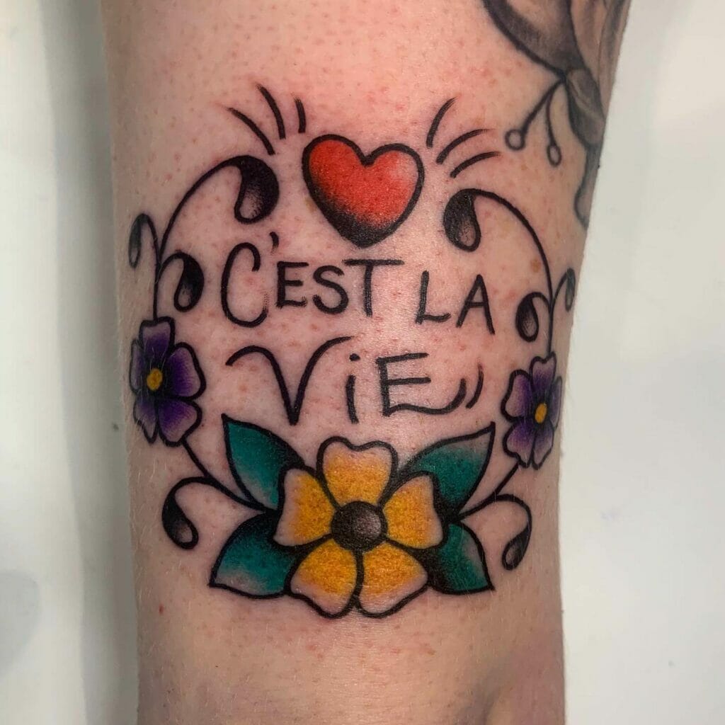 C'est La Vie tattoo with colorful flowers and heart design