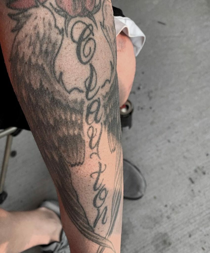 Angel wing tattoo on the arm for boys 