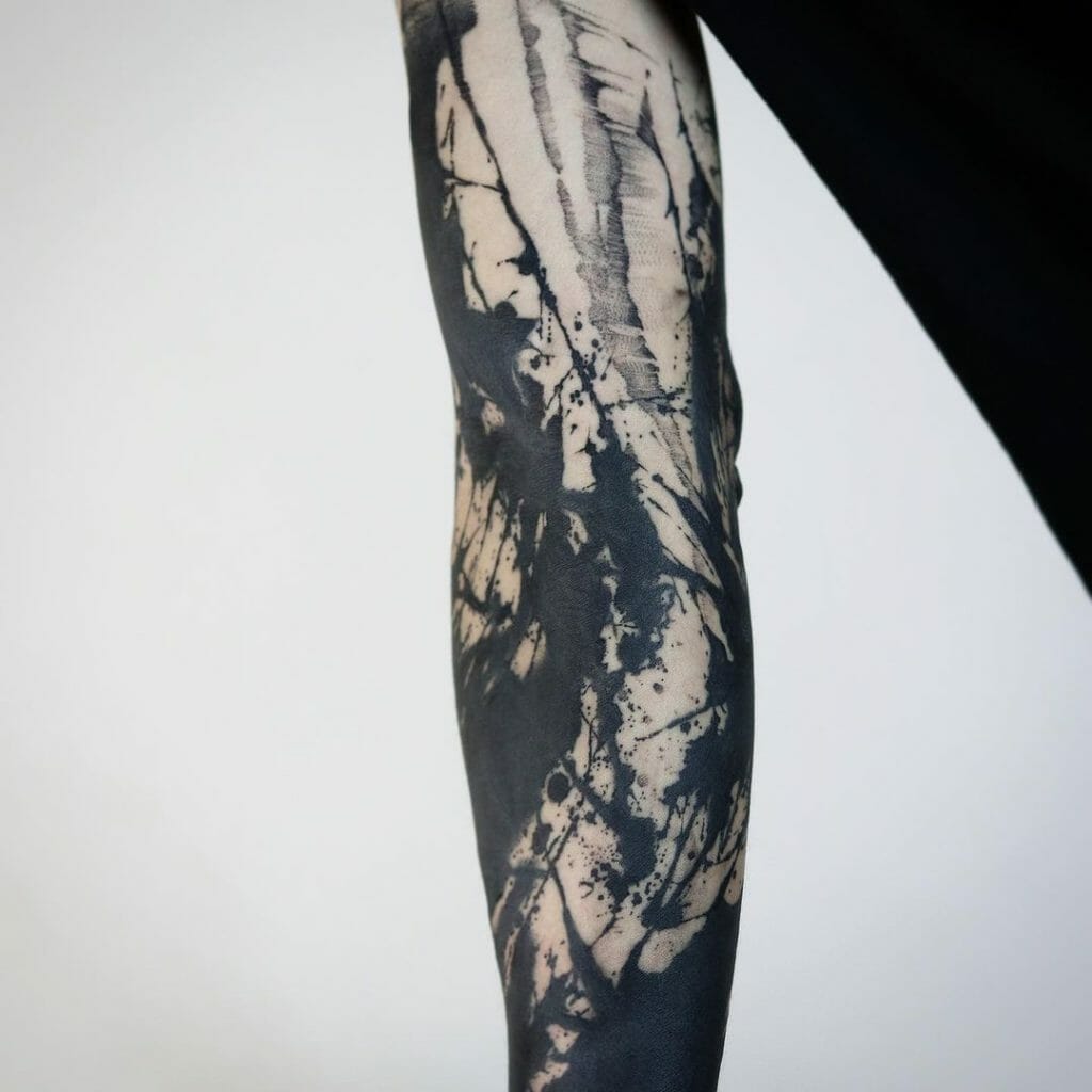 Black Watercolor Sleeve Tattoo