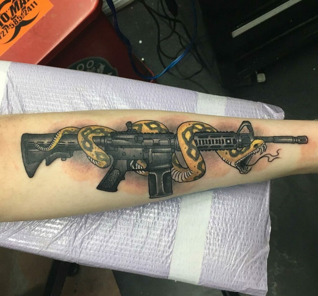 Deadly tattoo Ar 15 with snake