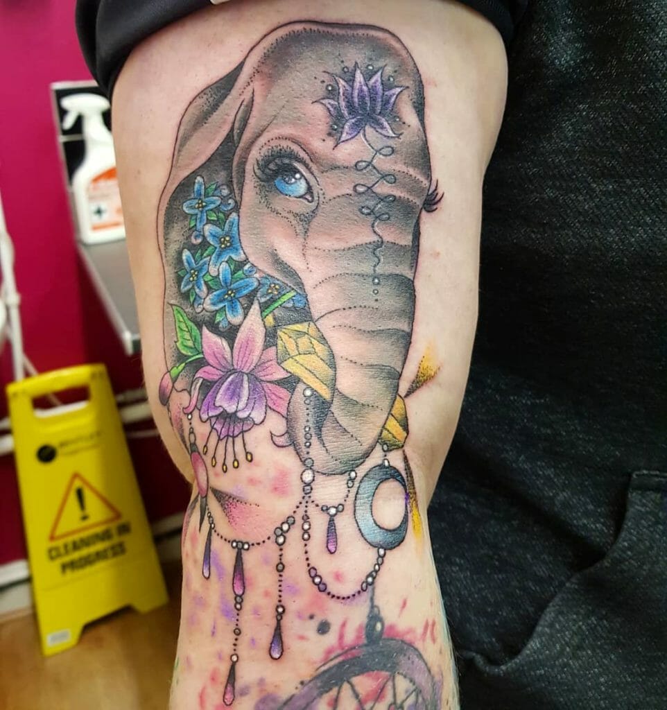 Flower and elephant design Tattoo Ideas