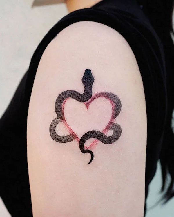 Snake wrapped around heart outline tattoo with bold black and red gradient