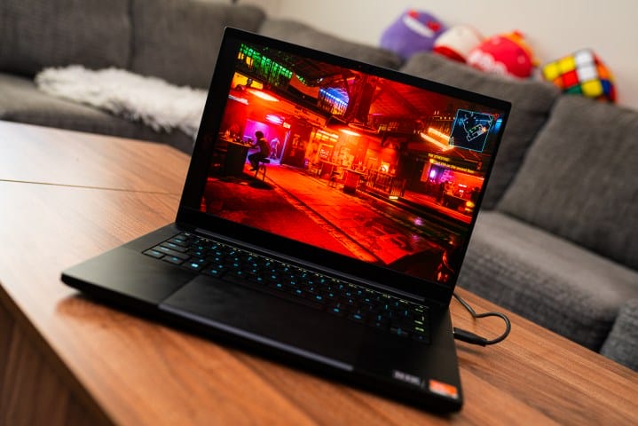 Razer Blade 14 gaming laptop on coffee table.