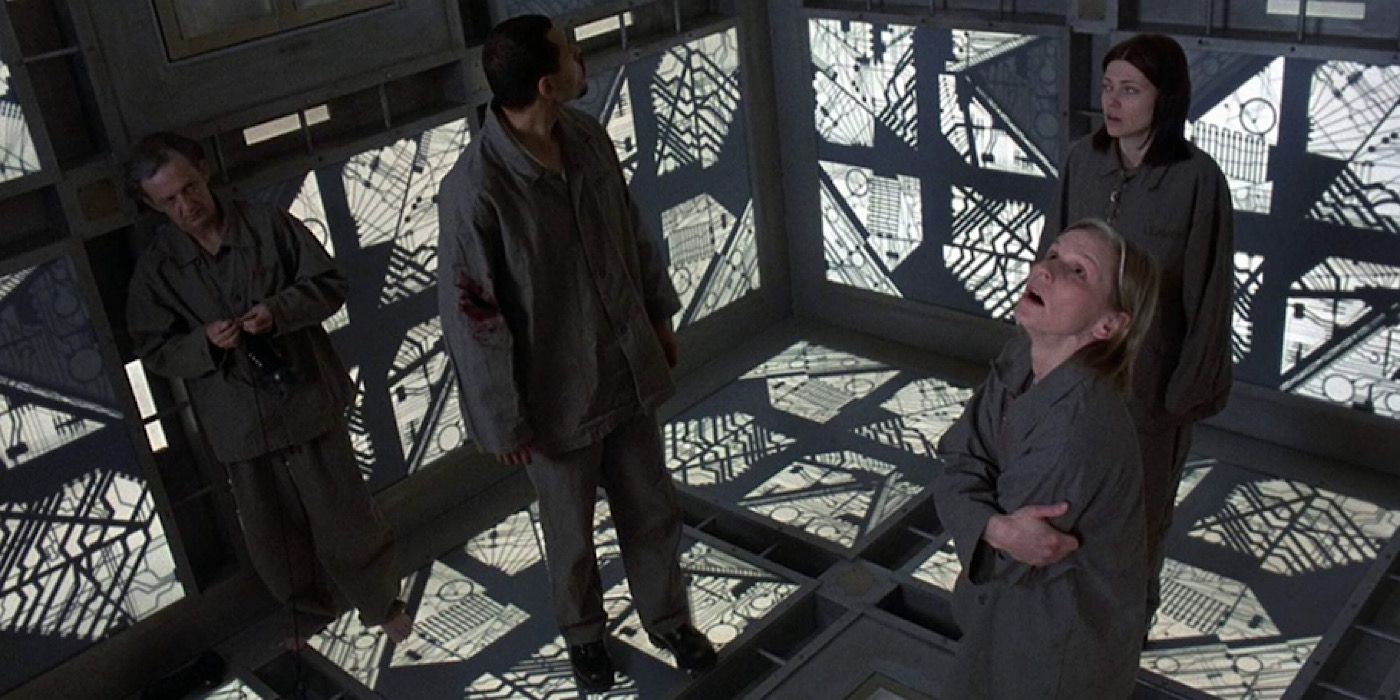 The people in the cube look around in the movie Cube. 