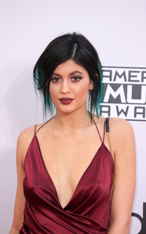 kylie jenner sexiest woman alive wearing a red dress and necklace