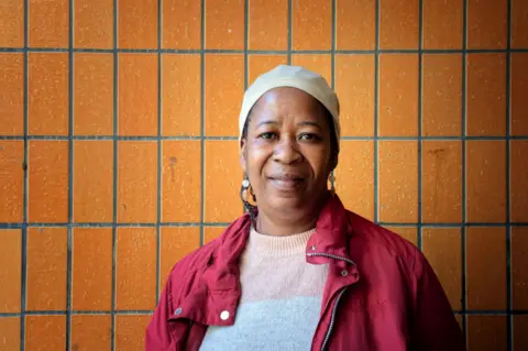 BBC /Laurence Cawley Picture of Florence Bouachie, who remains worried about safety from living in a high rise