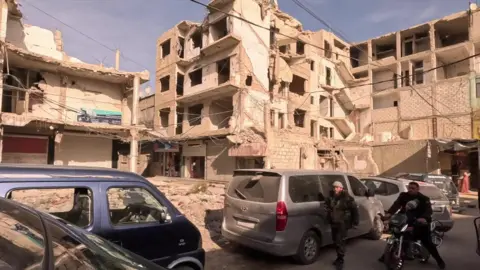 War-damaged buildings in the Eastern Ghouta, a suburb of Damascus (10 December 2024)