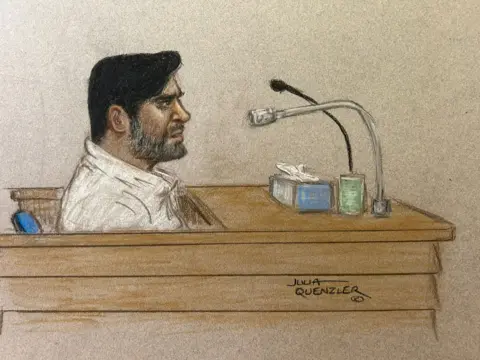 BBC/Julia Quenzler A court drawing of Urfan Sharif at the Old Bailey. It shows a side view of him. He is sat in a dock and is talking into a microphone