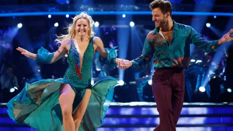 BBC/PA BBC handout photo of Sarah Hadland and Vito Coppola, during the dress rehearsal for Saturday's Strictly Come Dancing show on BBC1. Picture date: Saturday December 14, 2024.