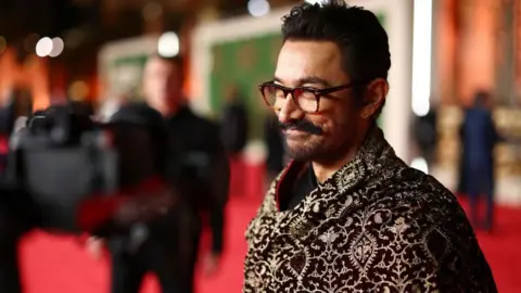 Getty Images A picture of Aamir Khan attending the Opening Ceremony at the Red Sea International Film Festival 2024