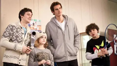 Getty Images Right to left: Tyger Drew-Honey, Ramona Marquez, Andy Murray and Daniel Roche in a sports hall