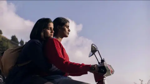 Girls Will Be Girls Kani Kusruti and Preeti Panigrahi in a scene from Girls Will Be Girls