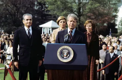 Gamma-Rapho/Getty Images Jimmy Carter, the Shah and their wives in Washington in United States on November 15th, 1977