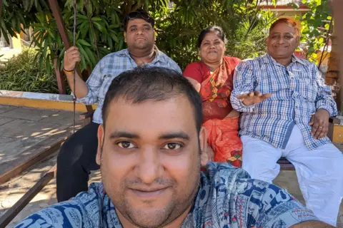 BBC Atul Subhash with his parents and brother in happier times