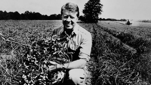 Getty Images Jimmy Carter on his Georgia peanut farm in 1976