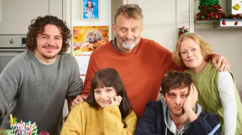 BBC/Hat Trick Productions/Adam Lawrence Right to left, Daniel Roche, Ramona Marquez, Hugh Dennis, Tyger Drew-Honey and Claire Skinner