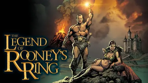 Gary Frank/Brad Anderson Artwork showing Wayne Rooney as a mythical hero in a furry loincloth holding up a flaming torch, and Coleen Rooney in a fantasy-style bikini costume lounging on a pile of rocks, with a castle and erupting volcano behind them. The words The Legend of Rooney's Ring are in Lord of the Ring-style lettering.