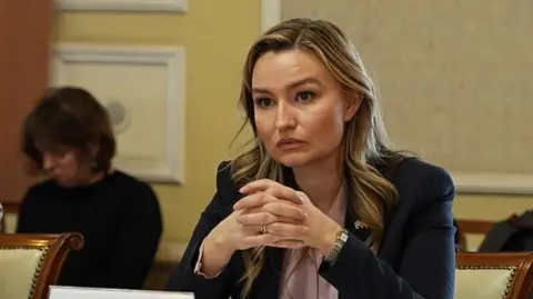 Getty Images Sweden's minister for Energy, Business and Industry Ebba Busch looks serious at a meeting. 