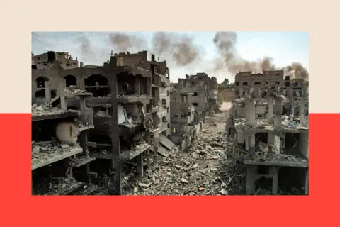 Getty Images An aerial view of buildings destroyed by Israeli air strikes in Gaza City