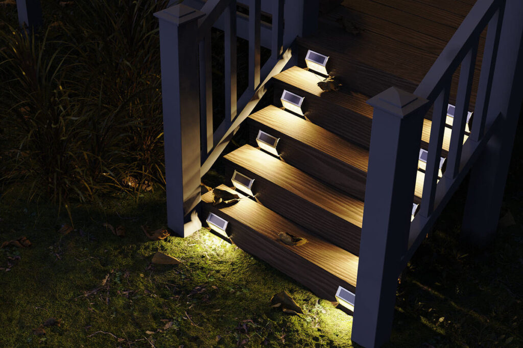 JACKYLED solar step lights installed on outdoor stairs, providing soft and energy-efficient illumination.